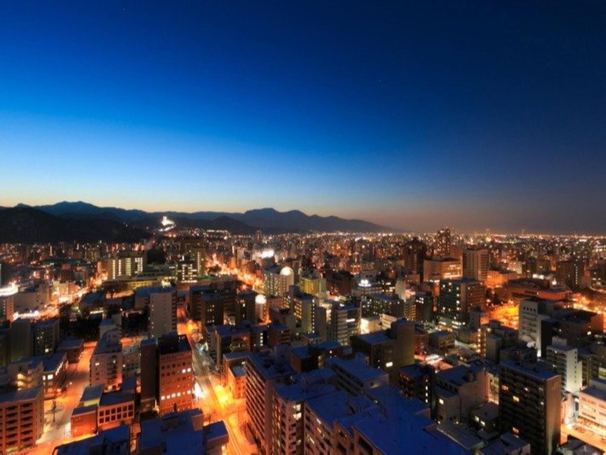 Sapporo Prince Hotel Exterior foto Santiago skyline at night